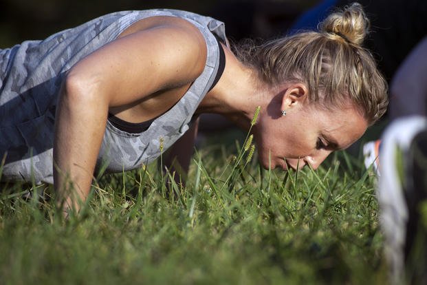 Lady deals push ups